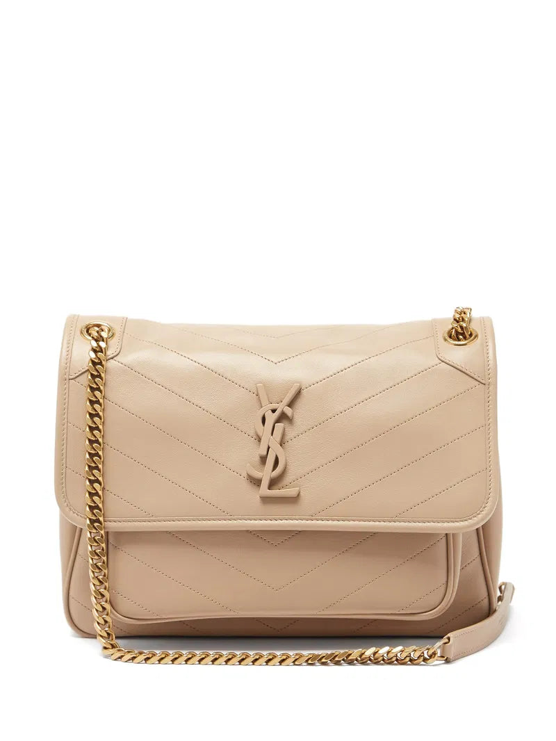 SAINT LAURENT
Niki Mini leather crossbody bag