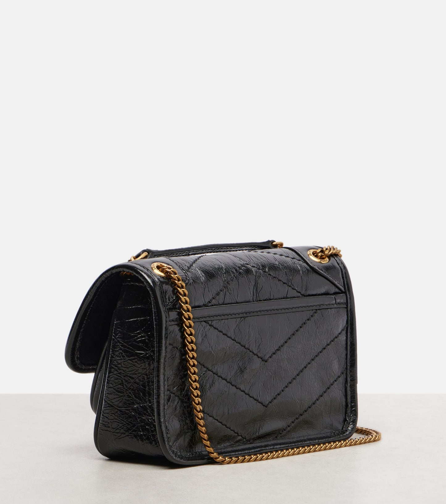 SAINT LAURENT
Niki Mini leather crossbody bag