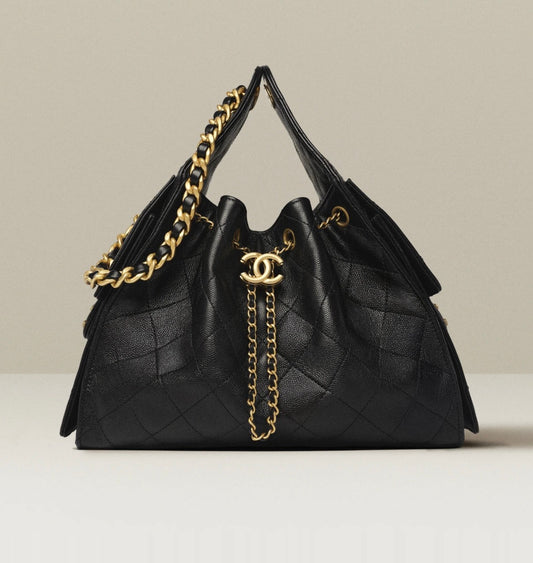 CHANEL 
Tweed Quilted Small Chanel 25