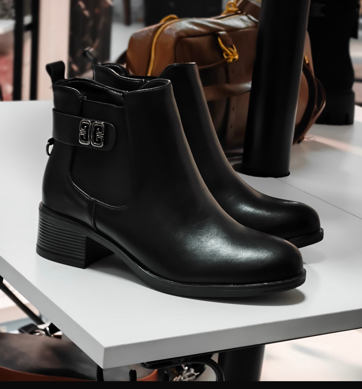 Black Leather Ankle Boots with Silver Detail