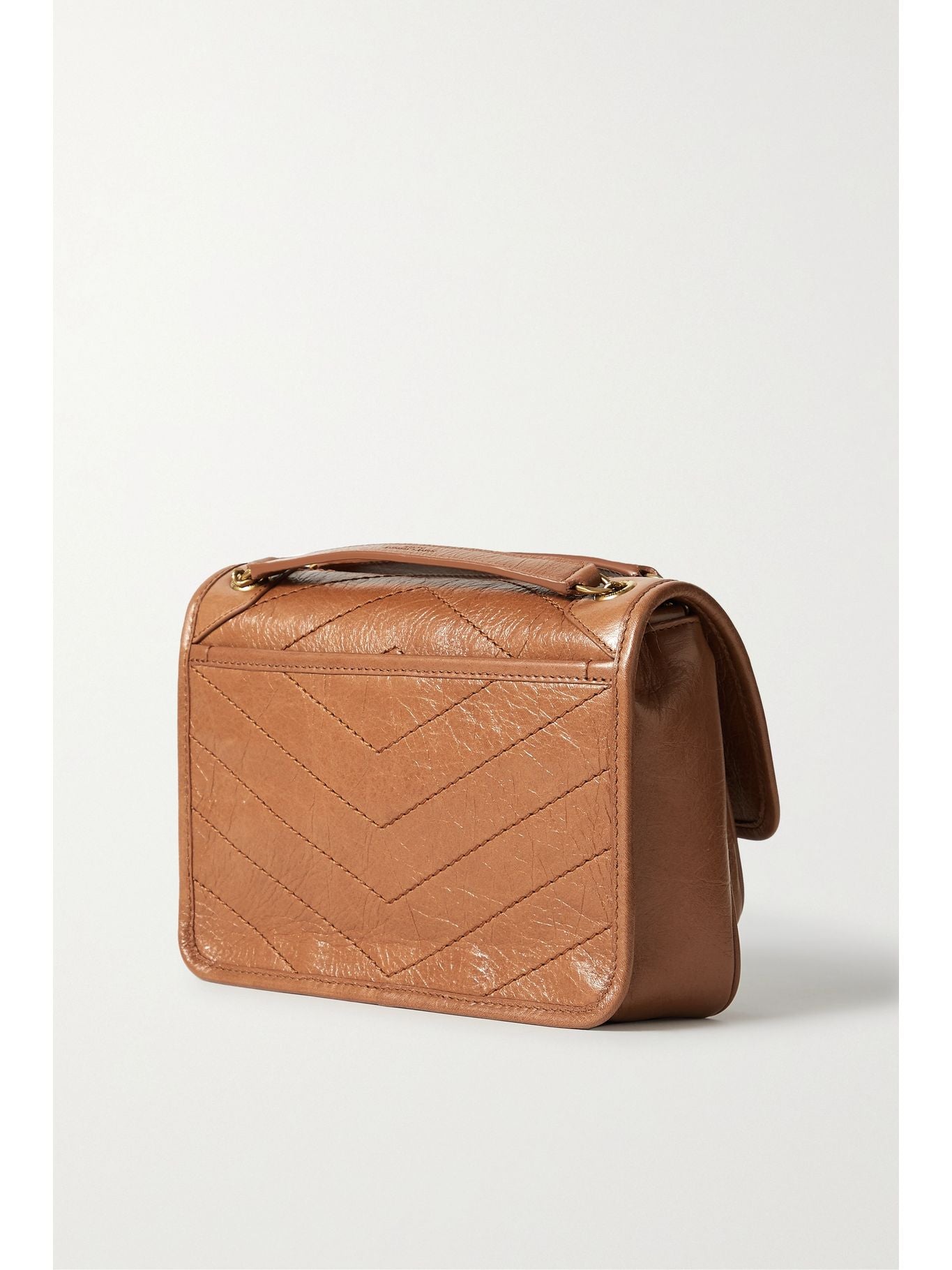 SAINT LAURENT
Niki Mini leather crossbody bag