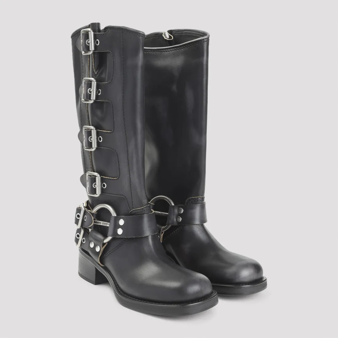 MIU MIU
Studded leather knee-high boots